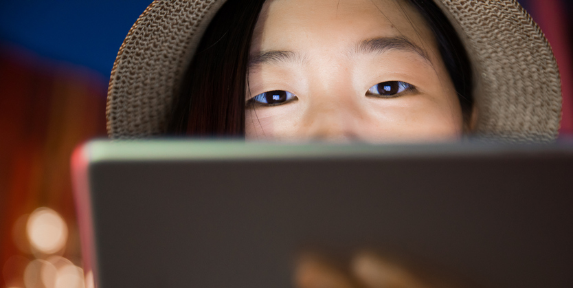 young women looking at digital tablet